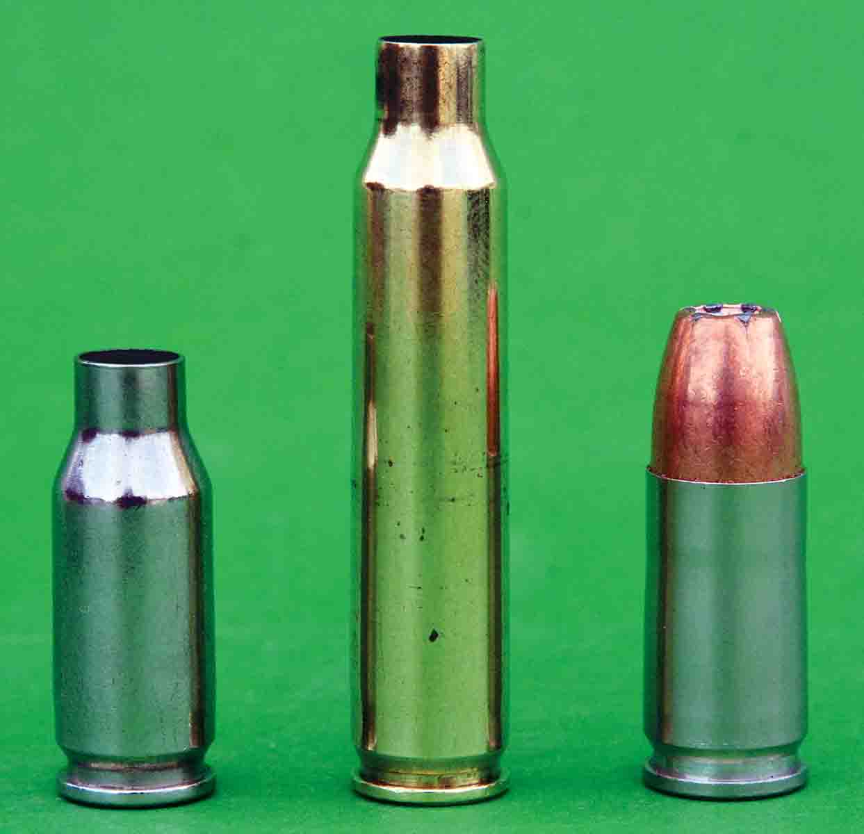 The 22 TCM case (left) is based on the 223 Remington case (center). For greater versatility, the 9mm Luger (right) can be used by changing the barrel and recoil spring.